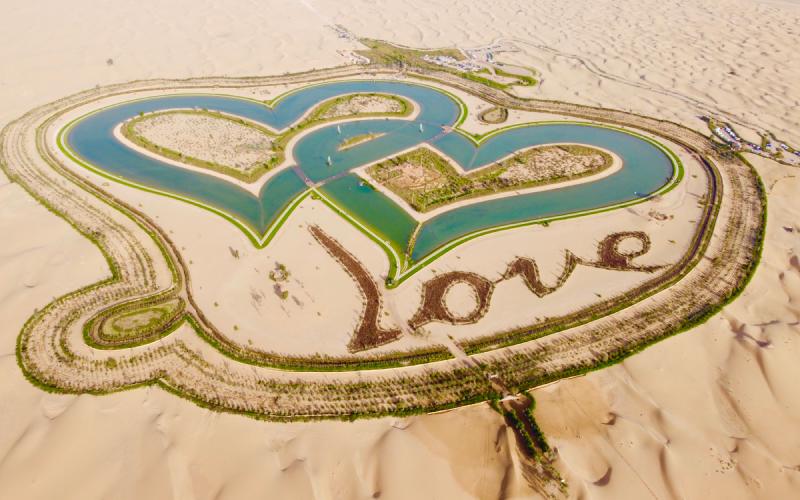 Different drone view of Love lake in Al Qudrah, Dubai